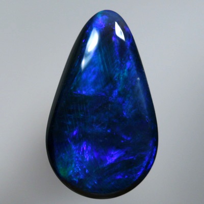SOLID BLACK OPAL Royal blue moving in rollling flashes
